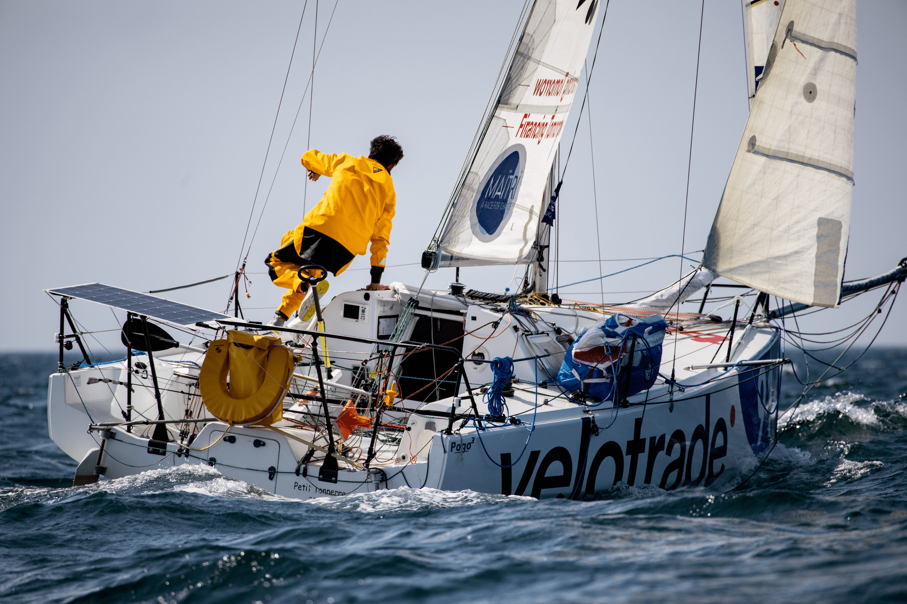 Close-up shot of the stern of the Velotrade sailboat at the Mini Gascogna 2021 preparation race for the Mini Transat challenge.